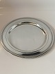 Georg Jensen 
Barnetallerken 
i Sølv
Stemplet #701B 
GJ
Måler 22,1 cm 
ca i dia
Pudset og pæn 
stand