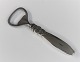 Georg Jensen. 
Kaktus. 
Flaskeåbner. 
Sølv (830). 
Længde 12 cm