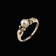 Georg Jensen. 
Ring i 14k guld 
med Perle #180.
Tegnet af 
Georg Jensen 
1866-1935.
Stemplet med 
...