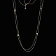 Georg Jensen 
Sautoir i 18k 
Guld med 
brillant 
0,10ct. -  
Regitze 
Overgaard - 95 
cm.
Stemplet GJ, 
...