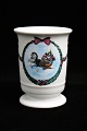 Royal 
Copenhagen 
julekrus 
"Jingle Bells" 
dekoreret med 
julemotiver på 
siden. 
H:10,5cm. ...