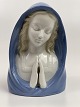 Lille 
porcelænsbuste 
af Madonna med 
foldede hænder 
i bøn. Figuren 
er stemplet WA 
med krone for 
...