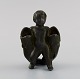 Just Andersen (1884-1943), Danmark. Art deco figur i diskometal. Dreng med to 
fisk. 1940