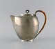 Just Andersen 
(1884-1943), 
Danmark. Art 
deco tin 
kaffekande med 
hank i flet. 
1940'erne. ...