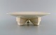 Longwy, France. 
Art deco bowl 
in glazed 
stoneware on 
tripod. Crackle 
design. 1940s.
Measures: ...