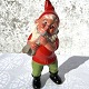 Clay Santa 
playing 
saxophone, 19 
cm high, 8 cm 
wide *With 
notch on 
saxophone*