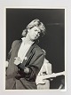Original black 
and white press 
photo of George 
Michael of Wham 
during the 
latter's tour 
of China ...