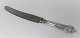 Michelsen. 
Sølvbestik. 
Rosenborg. 
Sterling (925). 
Middagskniv. 
Længde 25 cm.