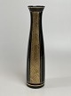 Elegant Art 
Deco vase af 
glass, 
1930'erne-
1940'erne. 
Sort/vinrød med 
guld. Vasen 
virker sort, 
...