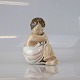 Rosebud nr. 
3009.
Kongelig figur 
i porcelæn. 
Design Th. 
Madsen 1928
Producent 
Royal ...