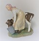 Royal 
Copenhagen. 
Porcelænsfigur. 
Pige med ko i 
farver. Model 
779. Højde 16 
cm. (1 
sortering).