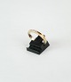 Alliance ring 
in 14 carat 
gold, stamped 
BRJ 585 by 
Bremmer Jensen 
with 3 0.05 
carat ...