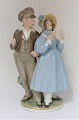 Royal 
Copenhagen. 
Porcelænsfigur. 
Hans & Trine 
med farver. 
Model 1783. 
Højde 24 cm. (1 
sortering)