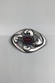 Tidlig Georg 
Jensen Sølv 
Broche No 11, 
Rav (1904-08) 
Måler 4 cm x 
5.6 cm (1.57 
inch x 2.20 
inch) ...