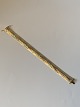 Armbånd 14 
karat guld 
Stemplet 14
Længde 19 cm 
ca
Brede 11,34 mm 
ca
Tjekket af ...