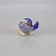 Kgl. 
porcelænsfigur 
med motiv af 
Finke med næb 
under vinge nr. 
1041
Producent 
Royal ...