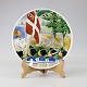 Platte nr. 196 
i fajance med 
FDF spejdere og 
Dannebrog
Design Oscar 
Willerup 1916
Producent ...