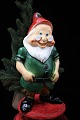 Old painted 
terracotta 
figure of Doc 
from the 7 
little dwarfs. 
Height: 27cm.