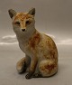 Royal 
Copenhagen 
stentøj 22751 
Kgl. Ræv, 
siddende 15 x 
10 cm. Gudrun 
Lauesen, juni 
1982 I fin og 
...