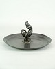 Fad, designet 
af Just 
Andersen med 
motiv af 
havfruefigur i 
disco metal fra 
1930'erne.. 
Ofte ...
