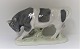 Royal 
Copenhagen. 
Porcelænsfigur. 
Stående tyr. 
Model 1195. 
Længde 38 cm. 
Højde 21 cm.  
(1 sortering)