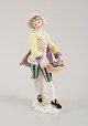 Antagelig tysk 
porcelænsfigur, 
herre med 
blomsterkurv, 
1800-tallet. 
Utydeligt 
signeret. ...