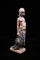 Dahl Jensen 
porcelænsfigur 
af "Pige fra 
Sierra Leone"
H:25cm. 
Dekorationsnummer: 
1117. ...