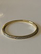 Bracelet 18 
carat gold with 
brilliants
Stamped 750
Length 59.66 
mm approx
Height 4.13 mm 
...