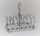 Sandwich 
holder. 
Sølvplet. 
Længde 16,5 cm. 
Lettere 
brugsspor