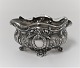 Spain. Silver 
(915) salt jar 
with glass 
insert. Length 
6 cm.