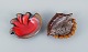 Vallauris, 
France, two 
snail-shaped 
bowls with 
glaze in shades 
of brown and 
red.
1960/70s.
In ...