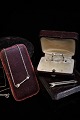 Torben 
Hardenberg 
jewelery set in 
sterling silver 
and white 
enamel, 
consisting of 
necklace, ...