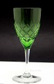 Lyngby glasværk, Antik glas med antik slibning og slebet stilk.Hvidvin med grøn kumme, der ...