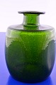 Holmegaard 
glasværk, grøn 
glasvase, højde 
14 cm. Bredde 
ca. 10 x 10 cm. 
Pæn hel stand. 
...