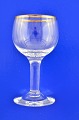 Nyhavn glas 
Holmegaard 
glasværk 
1950-1980.  
Nyhavn 
hedvinsglas med 
guldkant, højde 
9,7 cm.