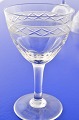 Svensk Ejby 
glas med 
olivenslibninger 
nederst på 
kummen. 
Portvinsglas, 
Højde 9,7 cm. 
Diameter ...