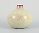 Osa, Denmark.
Unique ceramic vase in cream-colored glaze.