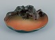Ipsens, 
Denmark. Rare 
dish in 
hand-painted 
glazed ...