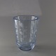 Vase i klart lyseblå glas med mønster af ranker med bladeProducent Orrefors glasværk, ...