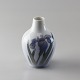 Kongelig 
porcelænsvase 
no 572/1227
Producent 
Royal 
Copenhagen
Vase i 
porcelæn i hvid 
med ...