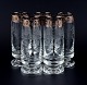 Murano, Italy, 
five 
mouth-blown and 
engraved 
drinking 
glasses with 
silver rim.
Mid 20th ...