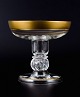 Rimpler 
Kristall, 
Zwiesel, 
Tyskland, 
mundblæst 
krystal 
champagneskål 
med guldkant 
dekoreret med 
...