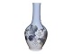 Royal 
Copenhagen 
lille vase med 
blomster.
Af 
fabriksmærket 
ses det, at 
denne er 
produceret i 
...