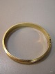 Armring 585 
Guld med 
enkelte tryk D: 
5*6 cm.
