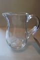 Antik 
flødekande af 
glas med sleben 
olivenmønster
H: ca 11cm
God stand
Lager: 1 stk
Varenr.: ...