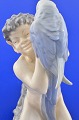 Faun Kgl. 
porcelænsfigur 
752 . Royal 
Copenhagen 
figur, faun 
siddende med 
papegøje, nr. 
752. ...