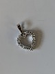 Heart Pendant 
in white gold 
#14 carat with 
brilliant
Stamped 585
Height 14.49 
mm approx
Width ...