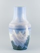 Arthur Boesen 
for Royal 
Copenhagen, 
kolossal unika 
vase i 
porcelæn.
Håndmalet med 
motiv fra ...
