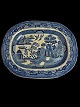Antique serving 
dish in 
earthenware 
with Chinese 
pattern. The 
pattern is 
called Blue 
Willow. ...
