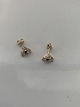 Earrings in 14 
karat gold with 
blue sapphire 
and zircons
Stamped 585
Height 7.25 mm
Nice and ...